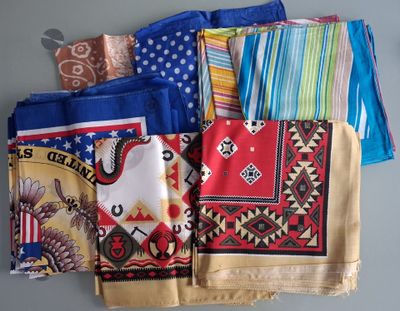 many different types of handkerchiefs laid out on a table
