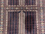 a close up of a rug with a pattern on it