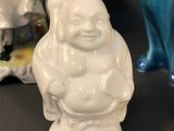 three figurines that are sitting on a table