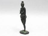an image of a statue of a woman standing on top of a base