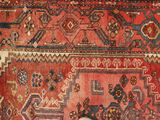a close up of a person ' s feet on a rug