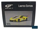 the box has a picture of a yellow sports car on it