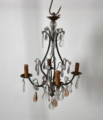 an image of a chandelier hanging from a ceiling in a room