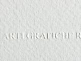 a close up of a piece of paper with the word artgraphicroma written on it