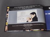 a book with a picture of a man smoking a cigarette
