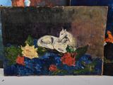 two paintings of cats sitting on a table next to each other