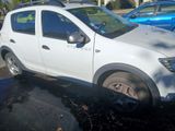 a white car that is parked in a parking lot