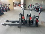 many different types of electric pallets in a garage
