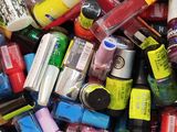 many different colored nail polish bottles in a pile