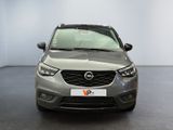 the front view of a grey opel parked in a room