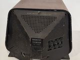 an old radio that is sitting on a table