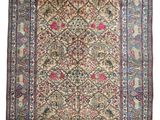 tapis persan ancien à motif floral sur fond beige