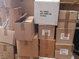 many boxes stacked on a pallet in a warehouse