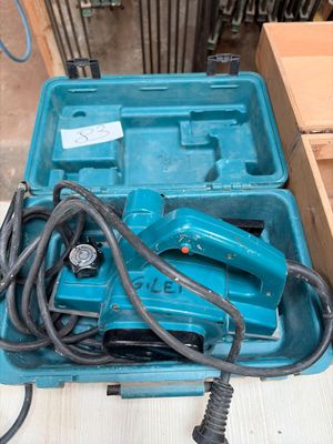 a blue tool box that has a bunch of tools in it