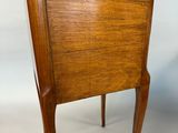 an image of a wooden chair with a curved back and legs