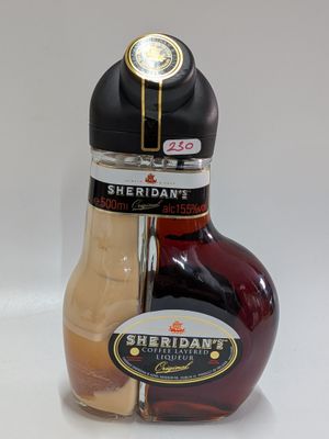 a bottle of syrup next to a bottle of syrup