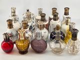 a lot of bottles that are sitting together on a table