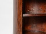 an image of a wooden bookcase with two shelves