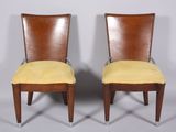 pair of art deco dining chairs with yellow velvet upholstered seats