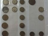 a lot of coins in a plastic bag on a table