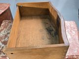 a small wooden table with a drawer on top of it