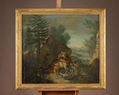 painting on easel of a painting of a man and a dog in a wooded landscape
