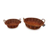 two brown wicker baskets with handles on a white background