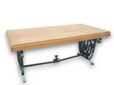 the table is made of wood and iron with a wooden top