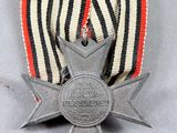 an image of a medal with a ribbon around it on a table