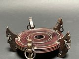 an image of a metal object on a table