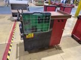 an image of a machine that is sitting in a warehouse