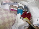 a pile of items in a plastic bag on the floor