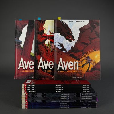 three books are stacked on top of each other on a table