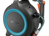 a close up of a black and blue speaker with a hose