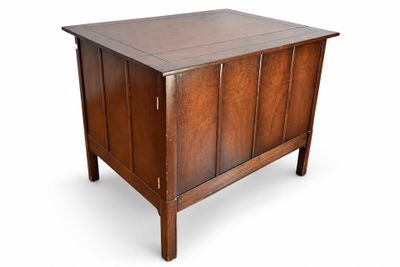 an image of a wooden cabinet with a drawer on top of it