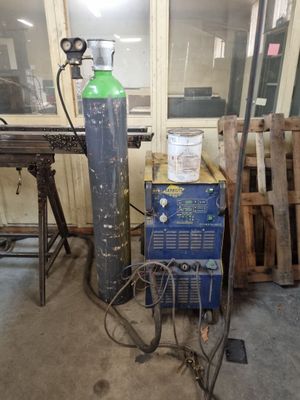 an image of a welding machine in a workshop