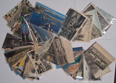 a lot of old postcards on the fridge