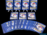 six packs of pokemon cards on display on a black background