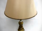 a lamp that is sitting on a table next to a lamp shade