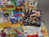 a lot of comic books sitting on a table