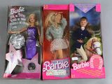 three barbie dolls are lined up in a row on a table