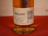 a bottle of alcohol that is sitting on a table