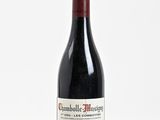 a bottle of wine that is sitting on a table