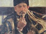 une peinture à l'huile représentant un homme fumant la pipe, assis dans un fauteuil