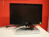 a flat screen tv sitting on top of a dvd player