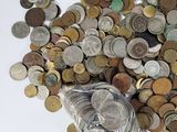 a bag full of coins sitting on a table