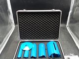 a case with three blue tools in it on a table
