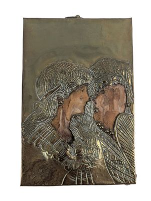 a picture of a metal plaque with a woman and a child
