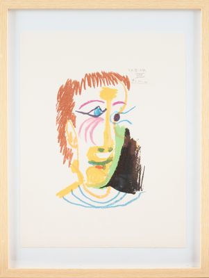 painting of a man ' s face in a wooden frame on a white background