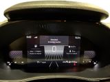 the dashboard of a car with a digital display on it ' s display screen